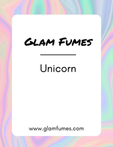 A colorful card with 'Glam Fumes' branding and the word 'Unicorn' perfume and body oil written on it, representing a product related to the fragrance 'Unicorn'.
